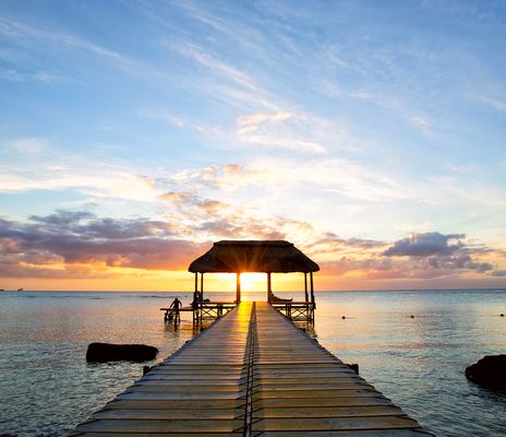 Steg und Sonnenuntergang in Mauritius
