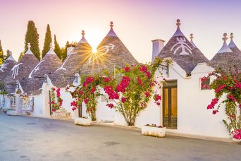 Trulli Häuser bei Sonnenuntergang