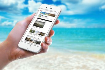 Mobiltelefon zeigt Youtube-Kanal von Berge & Meer