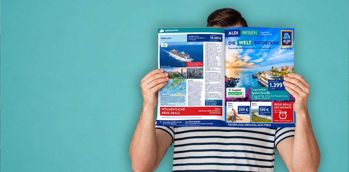 Mann mit Reisemagazin