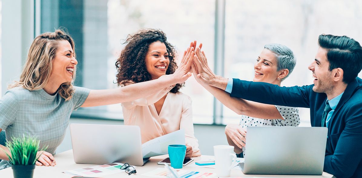 Team Business Freude bei der Arbeit